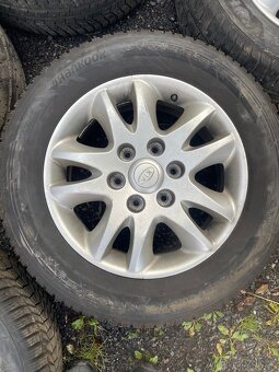 Komplet alu kola na Kia Carnival 6x139,7 pneu 235/60R17 - 2