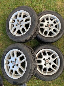 Alu disky s Pneu 165/65 R13 - 2