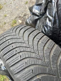 Zimní pneu Octavia II s disky 195/65/R15 + poklice - 2