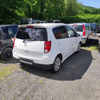 Mitsubishi colt 2004-2013r.v-1,1i,1,3i,1,5cdi - 2