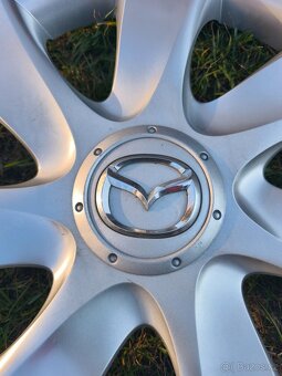 Kryty kol Mazda - 15' - 2