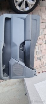 Tapecir předních levych dverí F150. F-150 2760505xr4 - 2