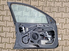 Peugeot 206- levé přední dveře - 2