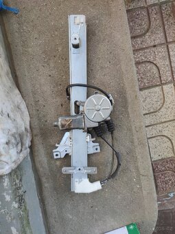 Kia Sportage I stahovačka okna - 2