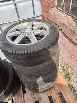 Alu kola 5x100 s pneu 195/55/r15 86 v - 2