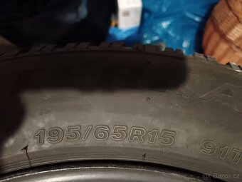 Zimní gumy na disku 19565R15 - 2