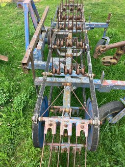 Obraceč-shrnovač ton - 2