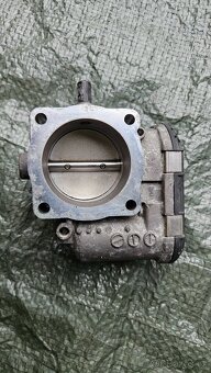 Škrtící klapka 1.8t 110-132kw - 2