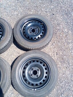 Sada kol 4x100, ET 35 vč. pneu Falken 165/70 R 14 - 2