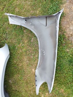 Prodám levý přední blatník na Bmw x5 e53, předface - 2