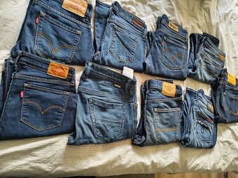 9 ks krásných dámských džín - 28 x 32 - 2