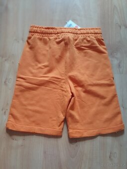 Nové teplákové oranžové kraťasy bermudy sinsay v.128 - 2