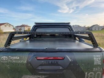 Nosič na postel/korbu Toyota Hilux 2015 - na roletu - 2