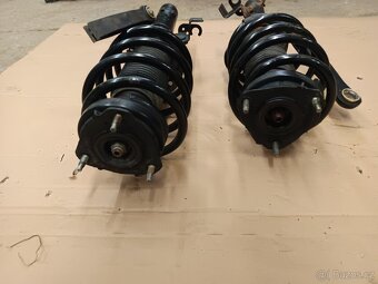 Prodám 2X TLUMIČE KOMPLET POLŠTÁŘE pružiny VW PASSAT B6 B7 - 2