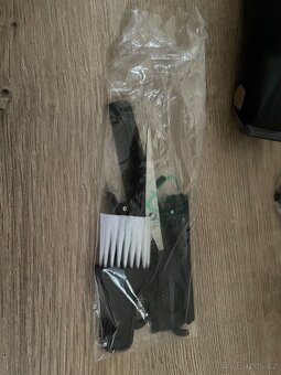 Zastrihovac vlasu / vousu - Remington HC 5030 - 2