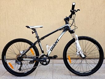 #25 Zánovní Giant Talon , pro 150-165cm - 2