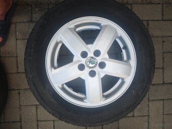 Škoda Octavia I-litá kola 5x100-Barum Brillantis2 195/65 r15 - 2