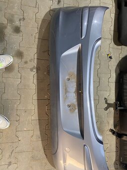 Zadní nárazník Opel Corsa D 1.2 2008 -5 dvéřová verze - 2