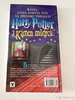 Kámen mudrců - J.K. Rowling I. vydání dotisk - 2