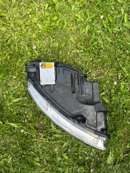 HELLA Přední světlo levé AUDI A6(C6) - 2