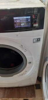 Aeg pračka se sušičkou 10/6 kg..1600ot - 2