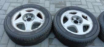 ALU kola Opel Astra G 2.0 DI + let. a zim. pneu (195/60 R15) - 2