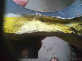 L držák světla OE BMW E34, E32 - 2