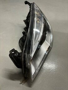 Světlomet Opel Astra - 2