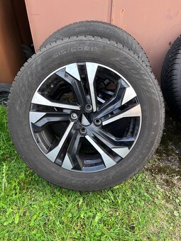 Prodám zimní Alu kola na Peugeot (2008) 215/60 R17 - 2