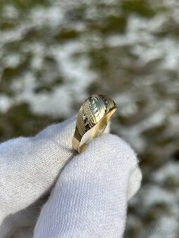 Zlatý prsten 1,22g - 2