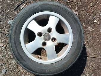 Litá kola s letními pneu 185/65 R14 - 2
