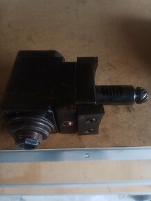 Poháněný držák - 2