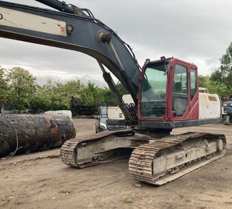 Pásový bagr CASE CX240B - 2
