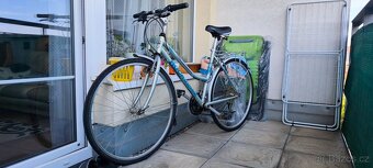 Dámské trekové kolo Rockmachine Trekkride 125, PC:14.990 CZK - 2