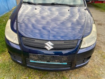 Prodám náhradní díly na Suzuki SX4 z auta najeto 240 tis km - 2