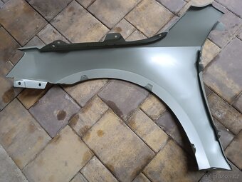 Škoda Octavia III. (před faceliftem) - pravý přední blatník - 2