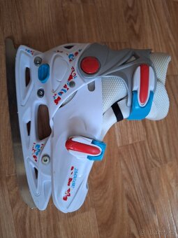 Dívčí brusle vel.31-34 - 2