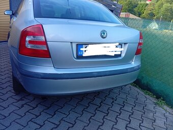 Prodám komplet zadní  páté dveře ,vrata na škoda Octavia 2 - 2