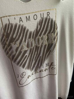 Nový luxusní italský pružný svetřík vel. 50 a více - 2