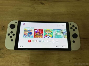 Nintendo Switch OLED model v záruce do 30.7. 2027 +4x HRA - 2