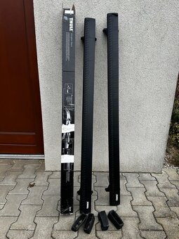 Střešní nosiče (příčníky) + montážní box na C292 - 2