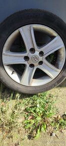 Litá kola original Mazda 16" - 2