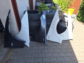 Blatníky , prahy BMW - 2