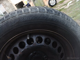 Prodám zimní pneu Opel corsa s plechovými disky 185/65/r15 - 2