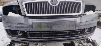 prodám přední nárazník na Škodu Octavii 2 před FL - 2