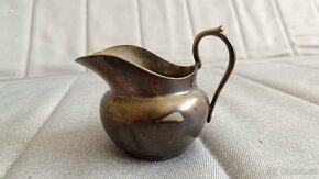 Malý plechový džbánek značky Christofle. - 2