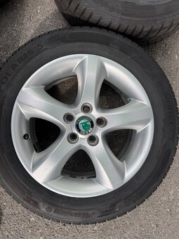 Zimní ALU Škoda Fabia 185/60 R15 - zánovní zimní 8mm DOT23 - 2