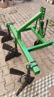 Prodám novou tříradličnou proorávačku brambor, nesenou za tr - 2