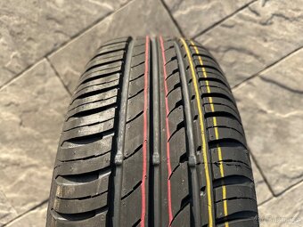 Plechový disk s pneu Continental 5x112 195/65/R15 - 2