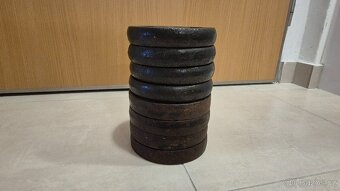 Prodám litinové 8x 1,25 kg kotouče - 30 mm otvor - 2